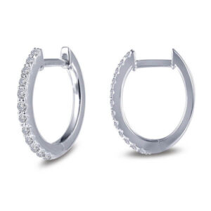 Oval huggie hoops are set with Lafonn's signature Lassaire simulated diamonds in sterling silver bonded with platinum. 10 mm x 11 mm Oval.