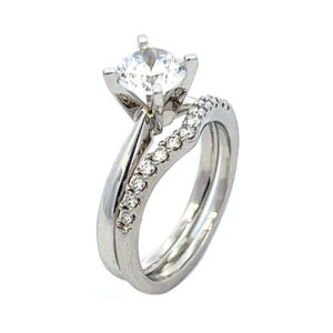 Pinched shank solitaire semi-mount engagement ring and .20ct tw French prong diamond band 