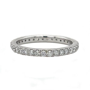 Anniversary or wedding band with shared prong brilliant cut diamond melee 