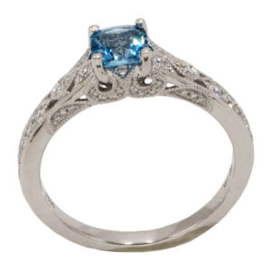 Cushion cut topaz in a vintage style white gold setting
