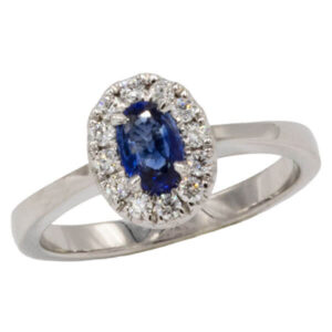Halo blue sapphire & diamond ring in white gold setting