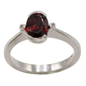 Oval cut rhodolite red garnet ring in a white gold setting