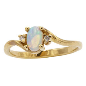 Oval cut opal in a gold freeform setting