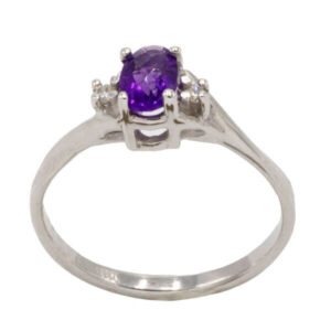 Oval cut purple amethyst with diamonds in a white gold setting