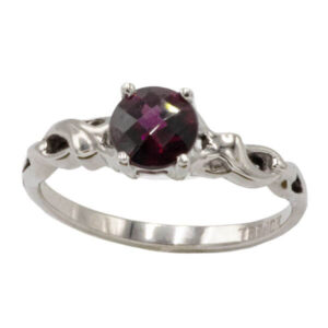 Round cut rhodolite garnet ring in a traditional white gold setting