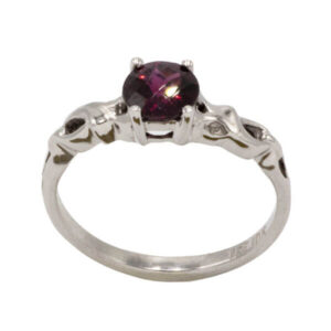 Round cut rhodolite garnet ring in a traditional white gold setting