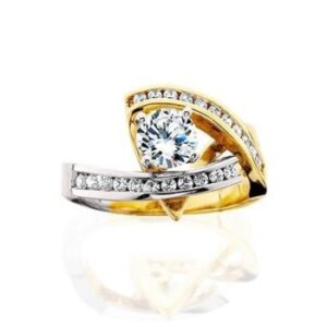 Aurum diamond engagement ring with a 4 prong peg head for the center and natural brilliant cut diamond melee 