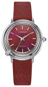 Silver stainless steel with red dial with additional red leather strap.