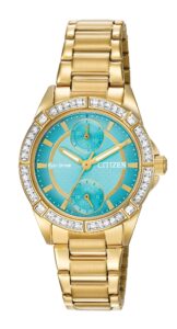 Gold tone stainless steel with turquoise dial.